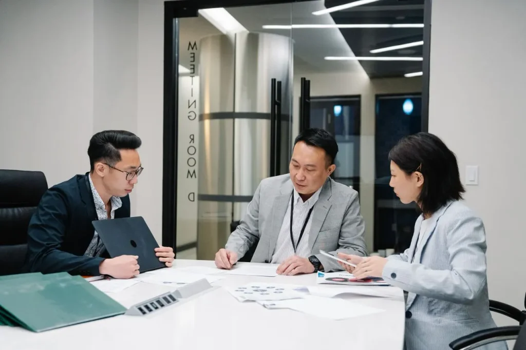 Business team reviewing internal systems and processes in Malaysia